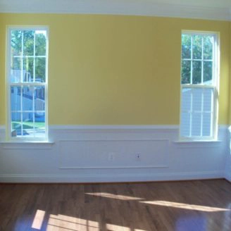 Ellicot city painting with white trim and yellow paint on walls