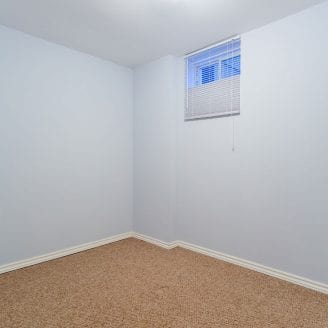 basement-bedroom-light-blue-color-finishing-in-baltimore
