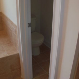 Enclosed toilet in Bathroom remodel Ellicot city