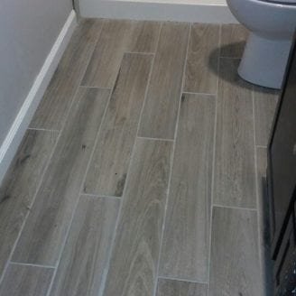 Wood look ceramic floor Bath Remodel in Canton MD