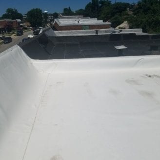 Flat roof Baltimore city Roofing contractor installation